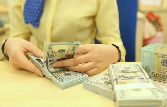 Tiền Việt Nam không bị trượt giá so với USD trong bối cảnh nhân dân tệ giảm liên tục